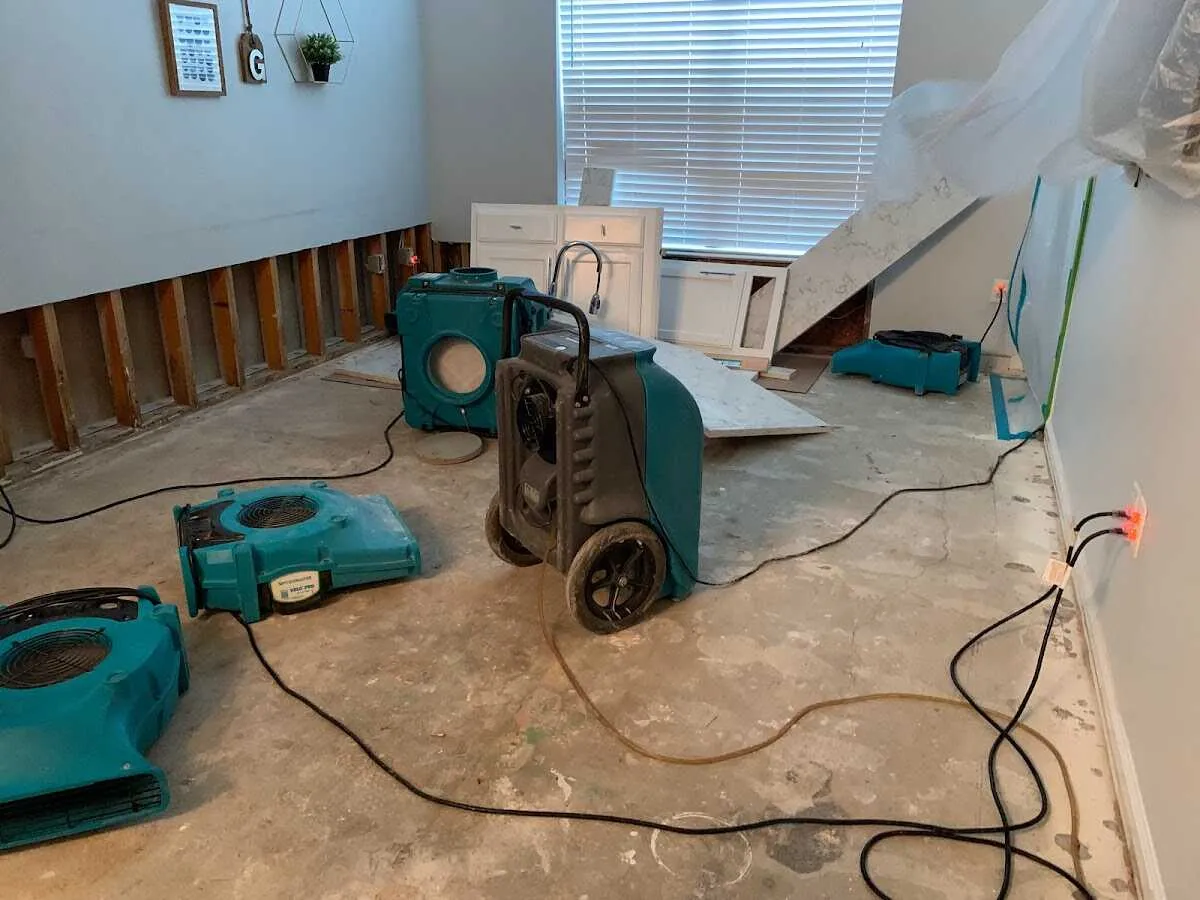 Dehumidifier in flood-cut room for Water Damage Restoration in Hudsonville